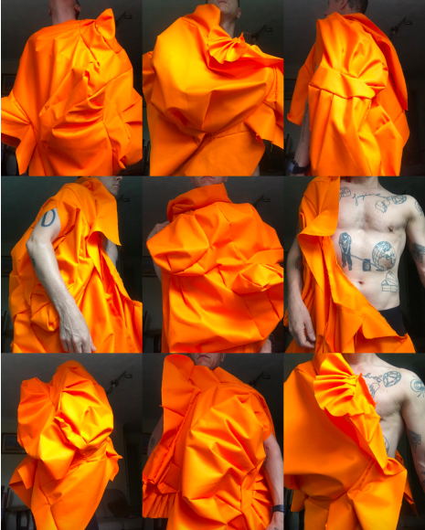 Immagine che contiene arancione, tessuto, collezione Descrizione generata automaticamente